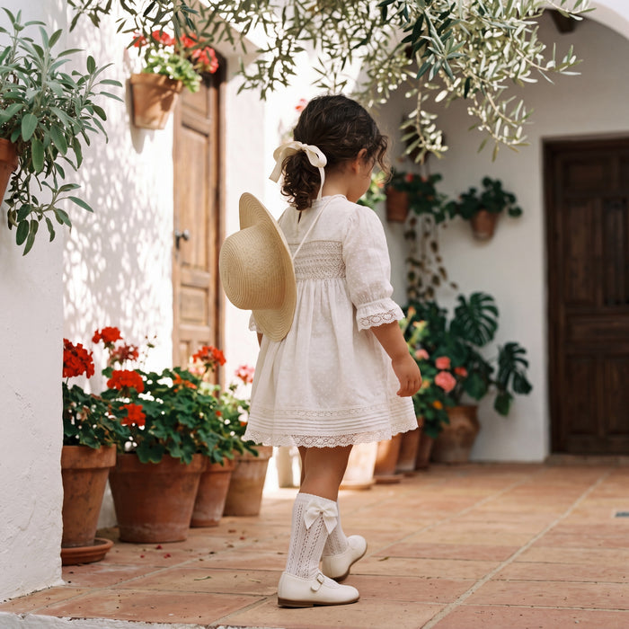 Girls Vanilla Perforated Socks with Bow β view 2 β handcrafted in Spain β AGΓ Baby