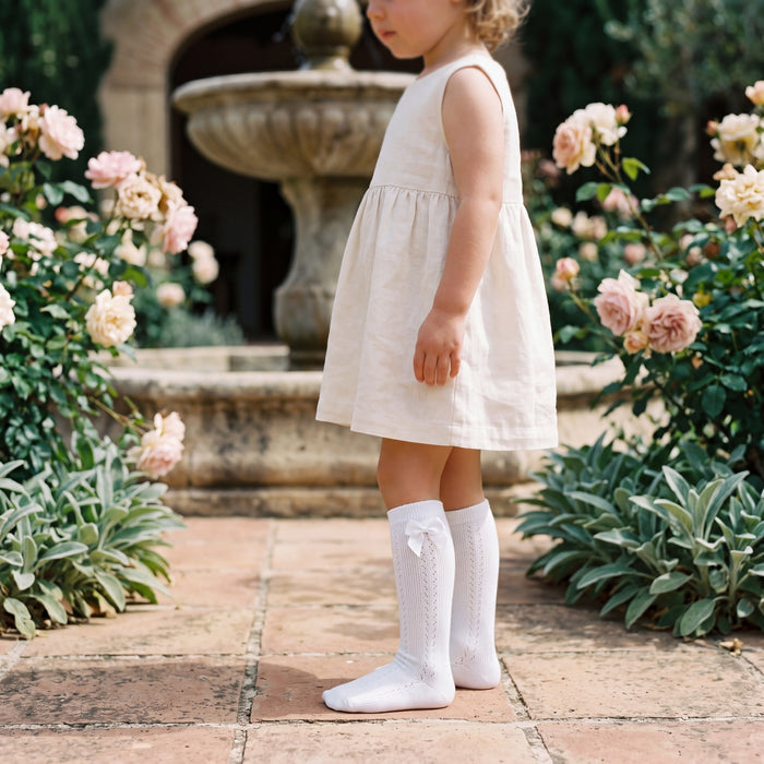 Girls White Perforated High Socks with Bow β view 2 β handcrafted in Spain β AGΓ Baby