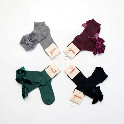 Girl Navy Blue High Socks with Side Velvet Bow — view 4 — handcrafted in Spain — AGÜ Baby