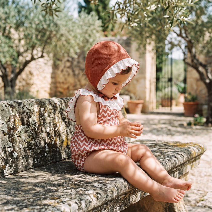 Red Zig Zag Romper — view 2 — handcrafted in Spain — AGÜ Baby